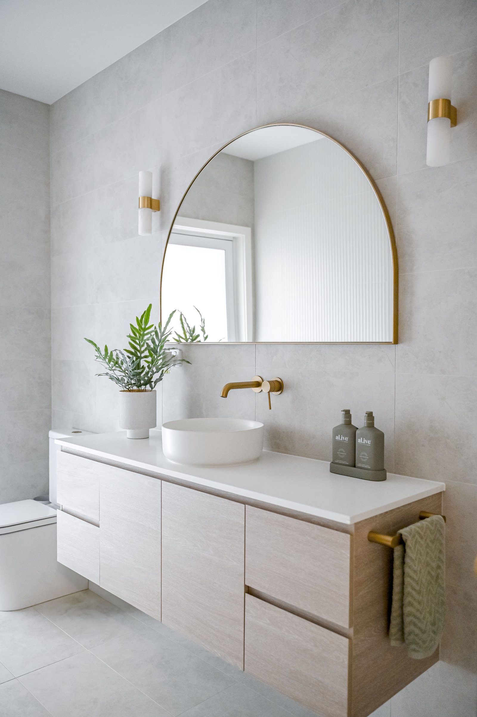 Bathroom renovation by Impact Homes Co.